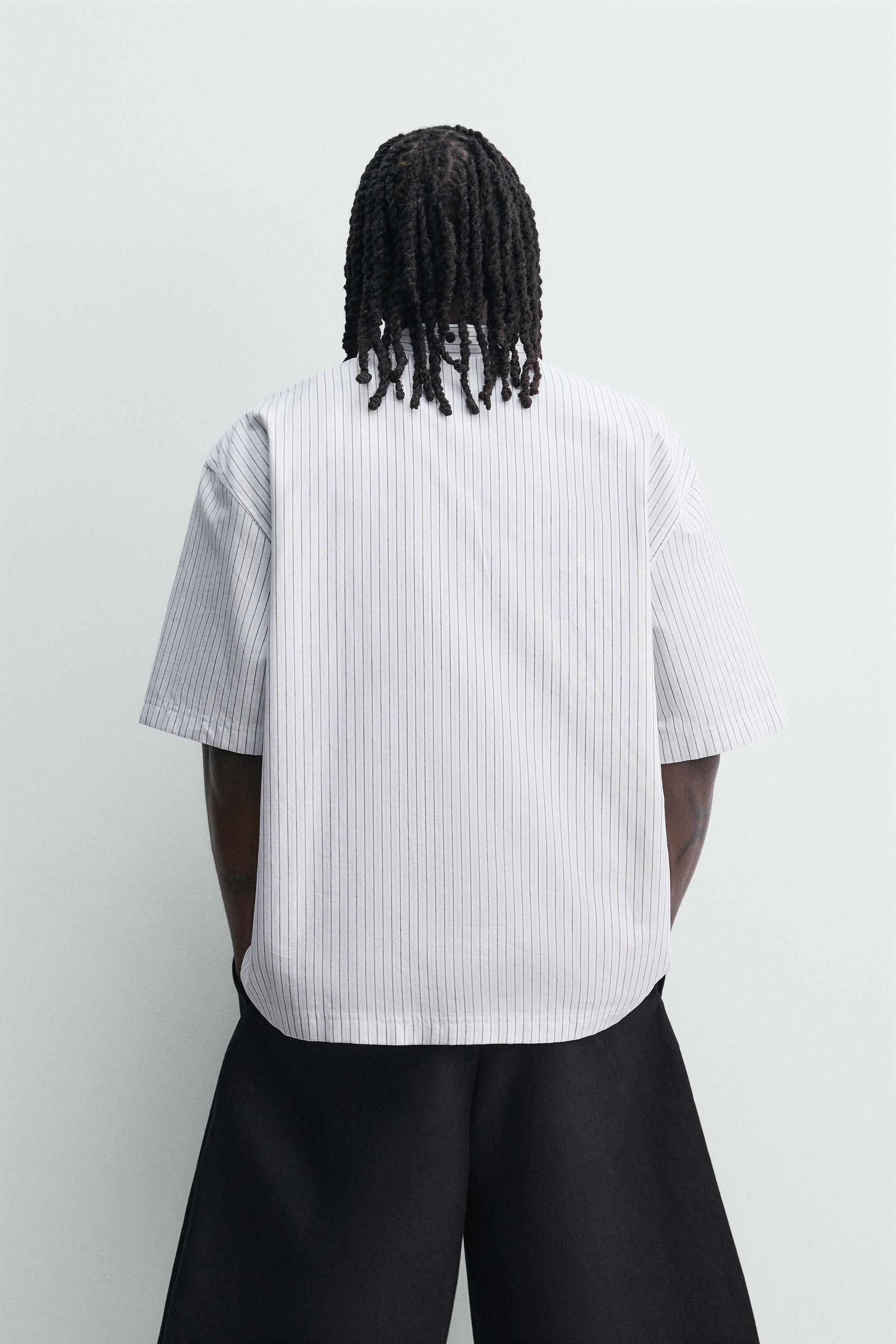 PRINTED TEXT BOXY FIT POLO SHIRT